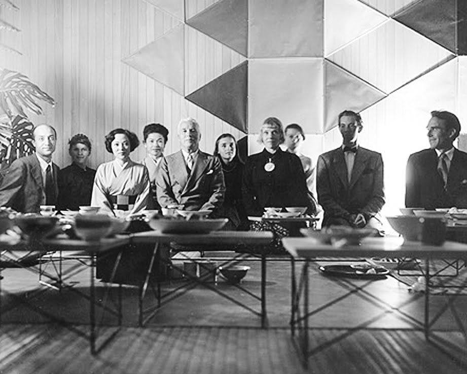 Isamu Noguchi, Shirley Yamaguchi, Charlie Chaplin, Charles Eames and others at a Japanese tea ceremony held at the Eames house, 1951