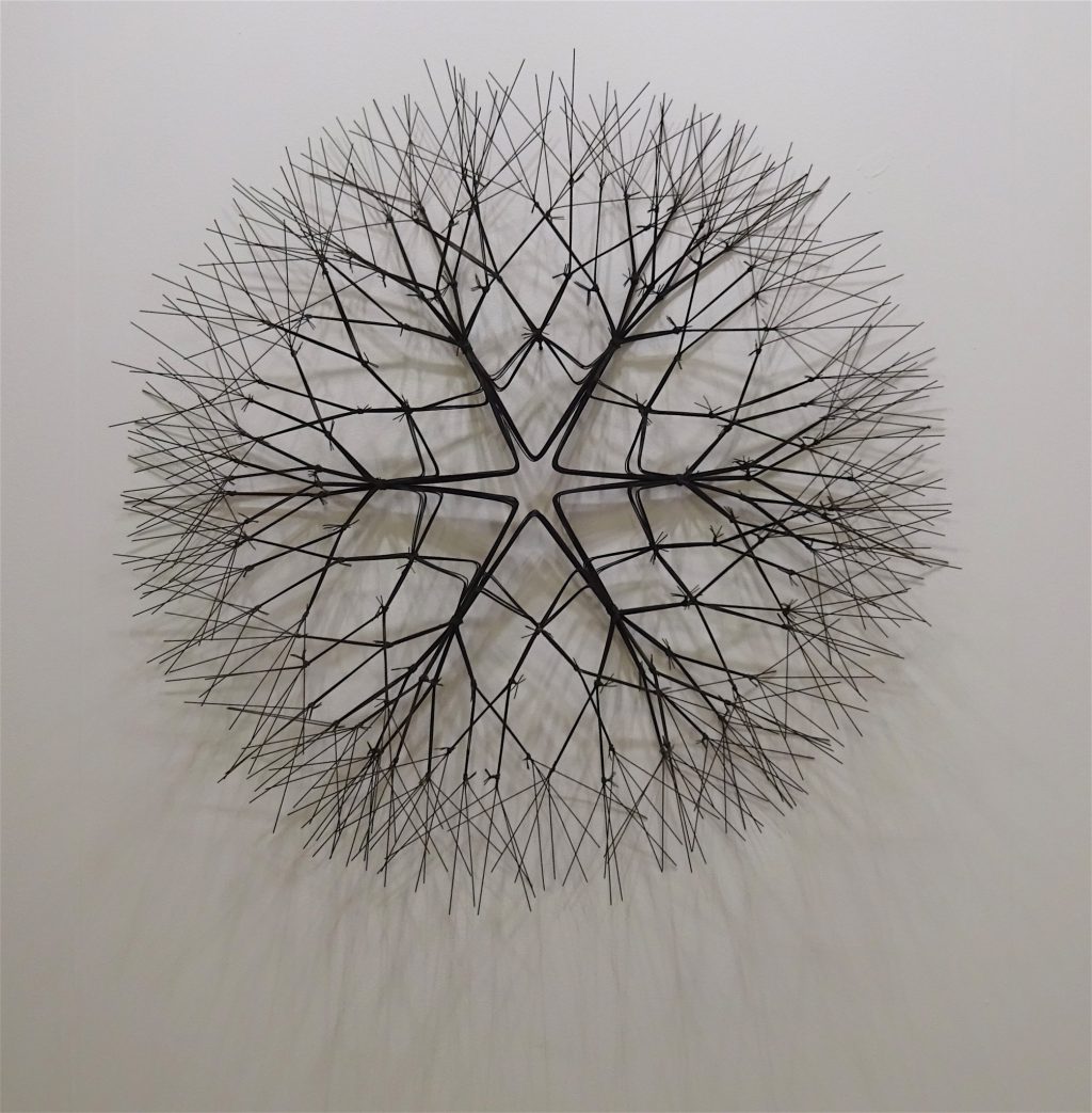 Ruth Asawa “Untitled (S.279, Wall-Mounted Tied-Wire, Open-Center, Six Branched Form)” c. 1965-1969, Wall-mounted sculpture, bronze wire, 83.8 x 83.8 x 22.9 cm @ David Zwirner