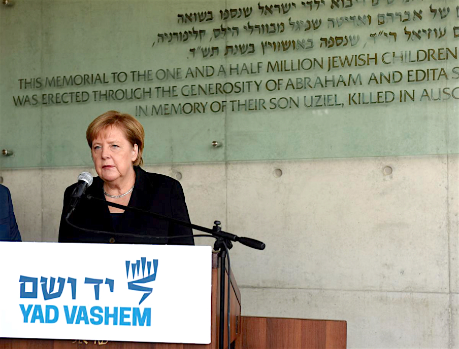 Chancellor Angela Merkel delivers a statement after signing the guest book at Yad Vashem World Holocaust Remembrance Center in Jerusalem October 2018