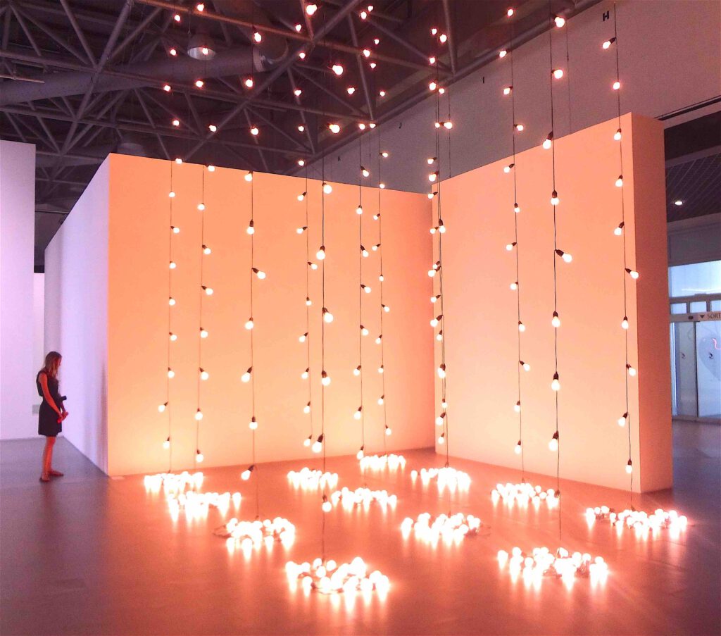 Sturtevant “Felix Gonzalez-Torres America America” 2004, Light bulbs, rubber light sockets and cords, 12 parts