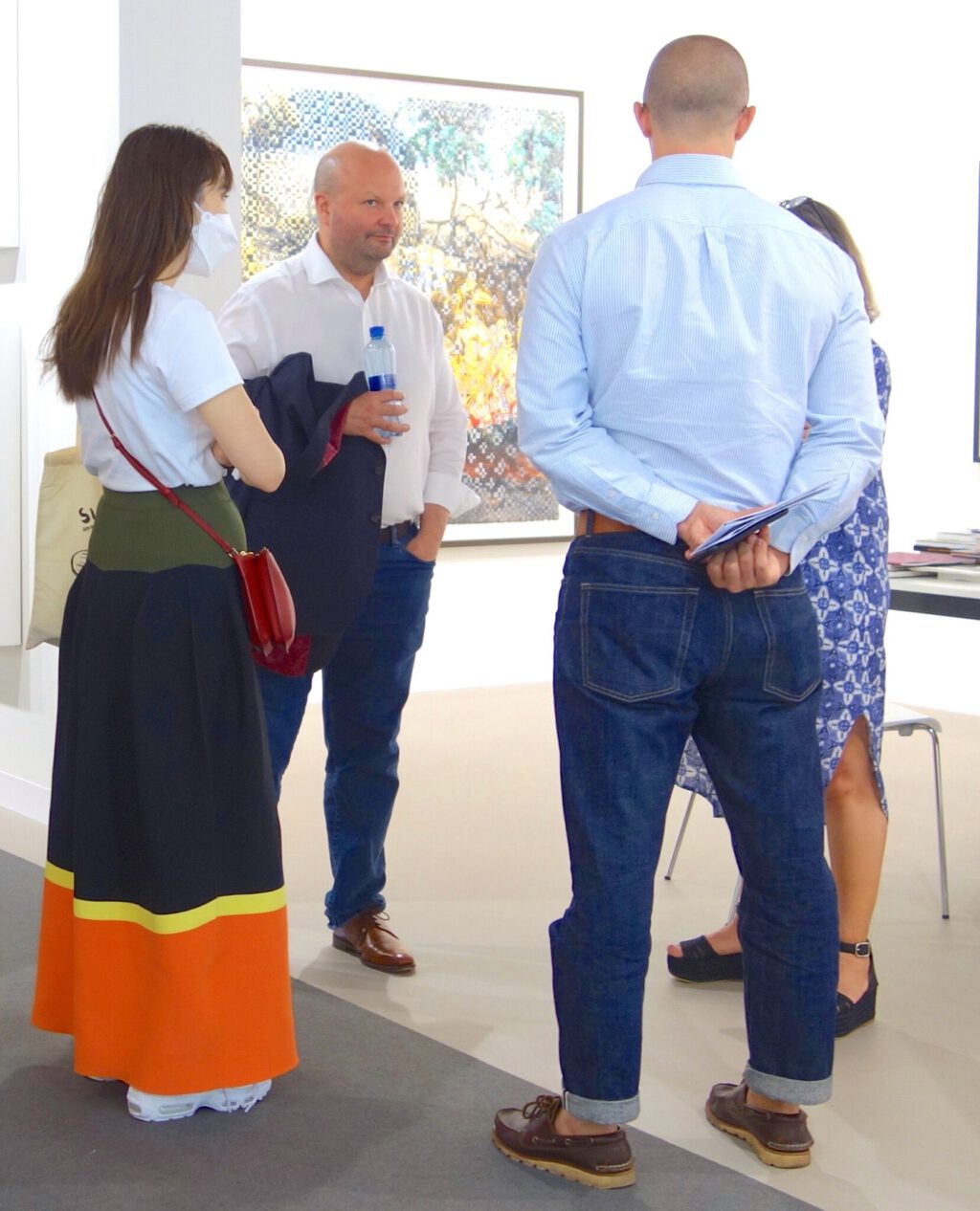 Fair director of TOKYO GENDAI, TAKANE Eri 高根枝里 (left) with TOKYO GENDAI co-founder Magnus Renfrew マグナス・レンフリュー (center) @ P.P.O.W. booth Art Basel Switzerland. June 16th, 2022