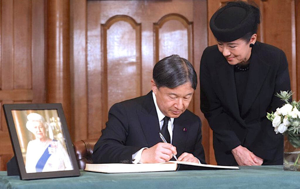Emperor Naruhito and Empress Masako of Japan sign a book of condolence at Church House in London, following the death of Queen Elizabeth II