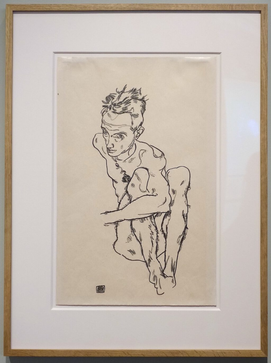 Egon Schiele Seated Male Nude (Self-Portrait) 1917, Black crayon on paper