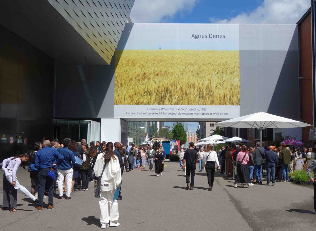 Art Basel 2024 with the board about Agnes Denes “Honouring Wheatfield – A Confrontation”