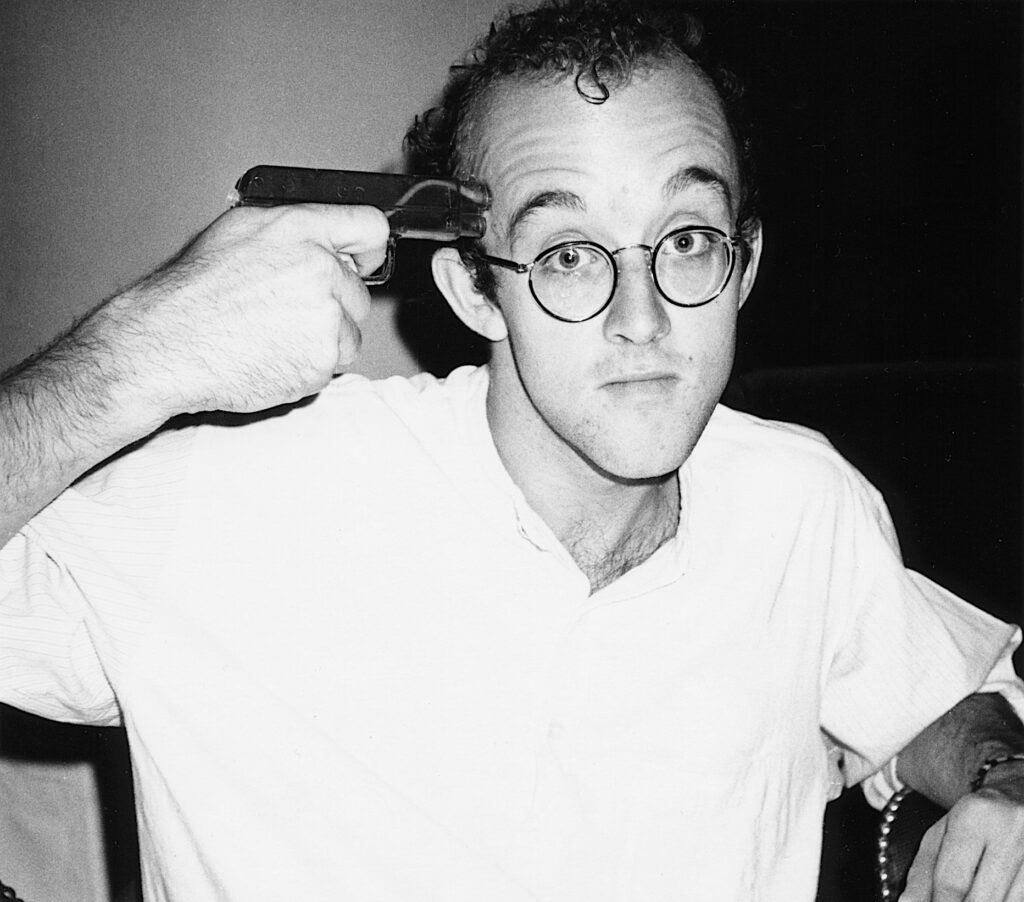 Andy Warhol Keith Haring with gun 1983
