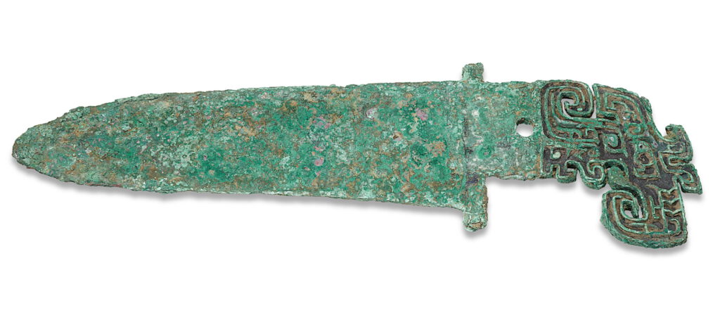 AN ARCHAIC BRONZE DAGGER