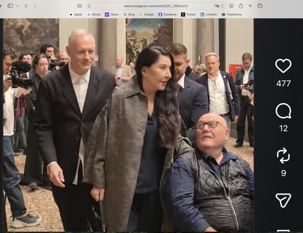 2026, May 4th. Press Conference by Marina Abramović. Solo show “Transforming Energy” @ Gallerie dell’Accademia, Venezia, 2026 May 6th – Oct 18th, with her art dealer Sean Kelly, sitting.