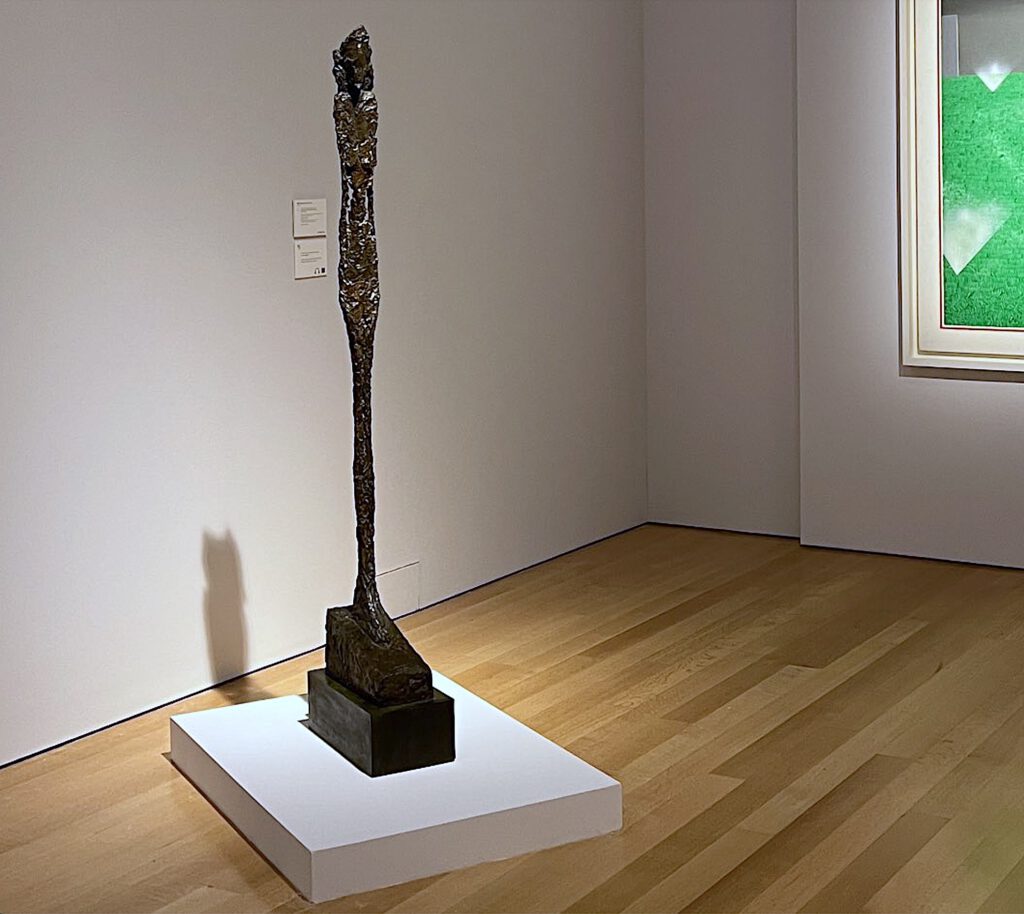 Alberto Giacometti “Standing Woman Femme Leoni” 1947, Bronze, 153 cm high, incl. base. Bought in 2020 @ Sotheby’s for US$ 25.9 million; sold in May 2024 @ Christie’s New York for US$ 19 million. (photo)