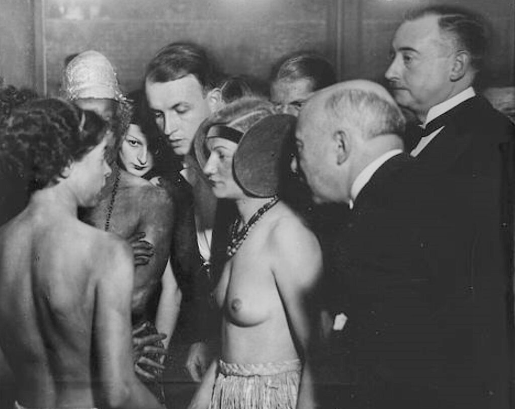 Brassaï Bal de la Horde, Montparnasse, with Madeleine Lequeux (centre) , 1930