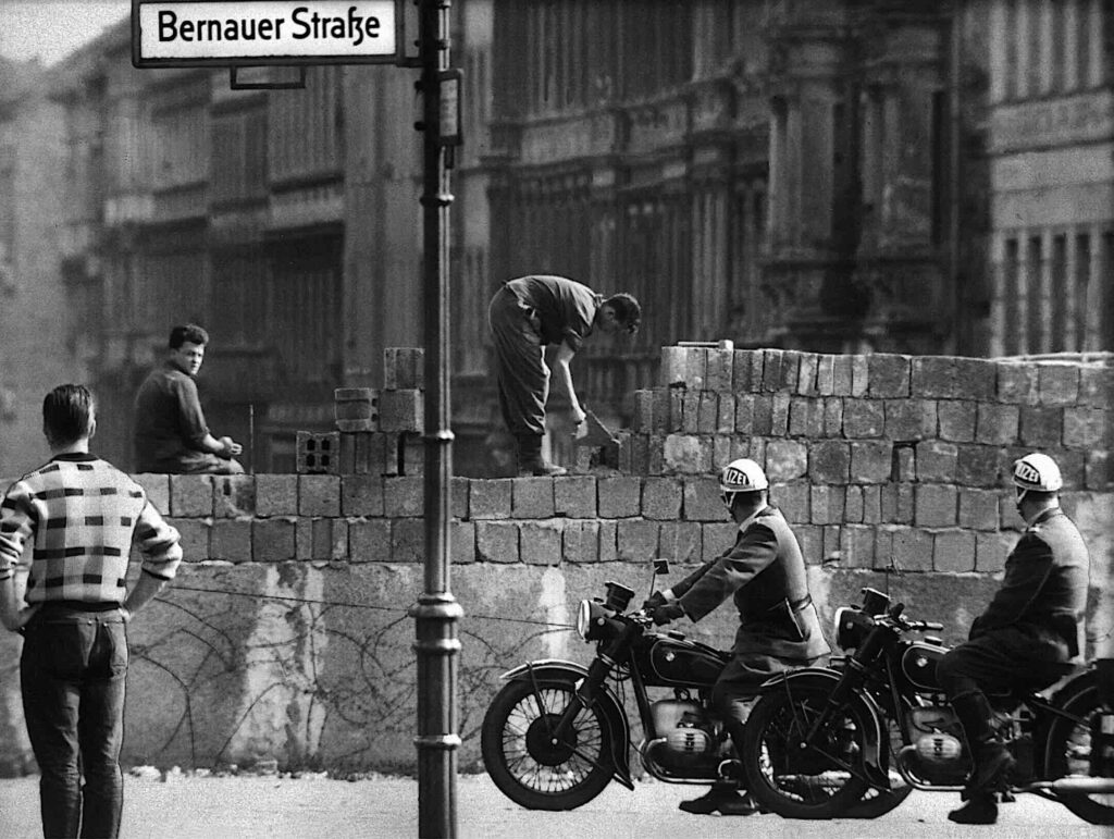 In August 1961, workers erected the “West-East Berlin Wall” along Bernauer Strasse. In August 1961, workers erected the “West-East Berlin Wall” along Bernauer Strasse.